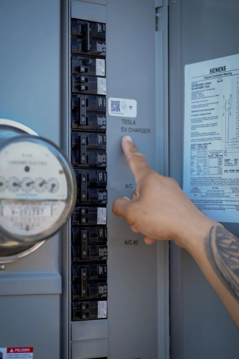Quantum Thunder inspecting a residential electrical panel and meter