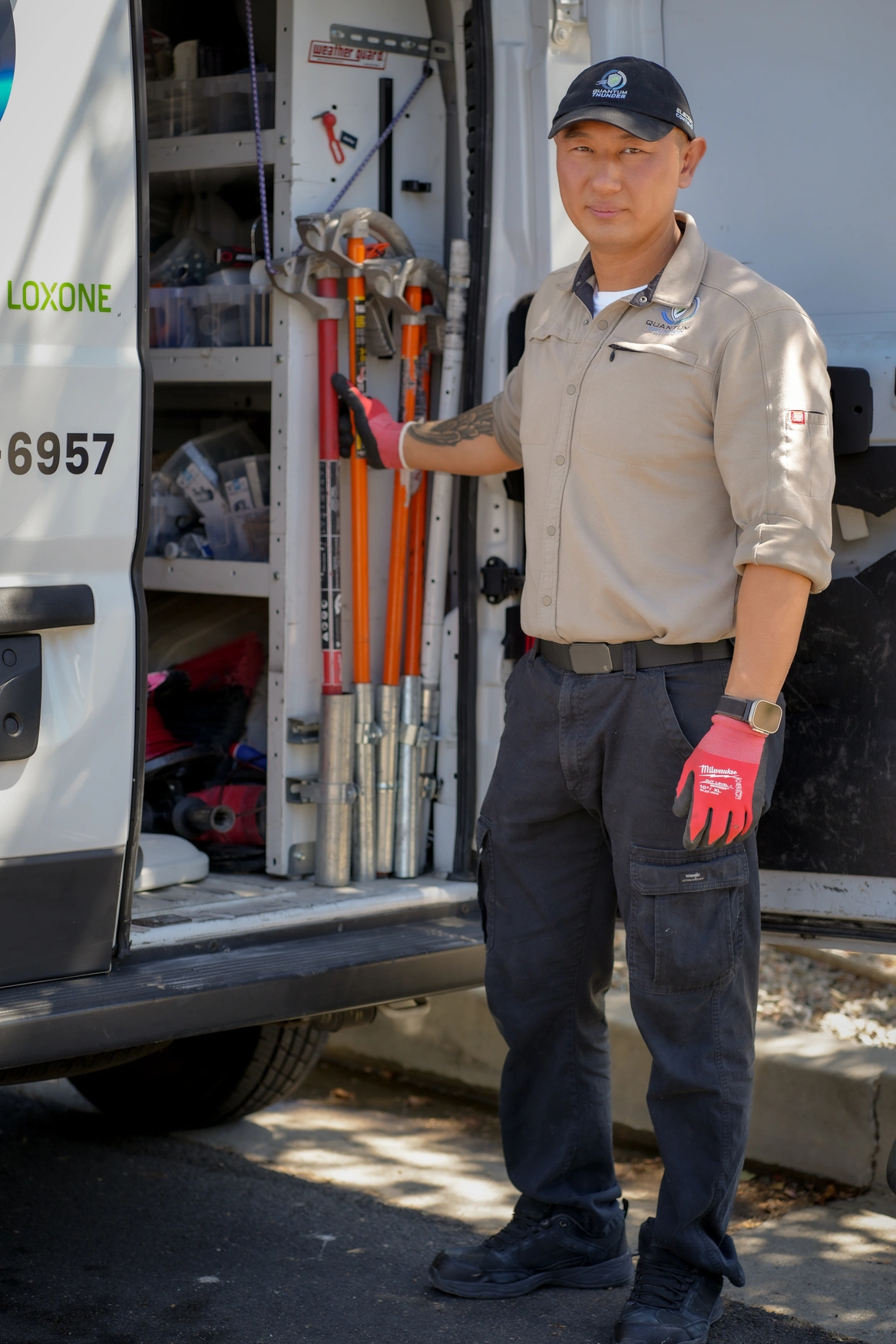 Quantum Thunder technician performing professional electrical service work